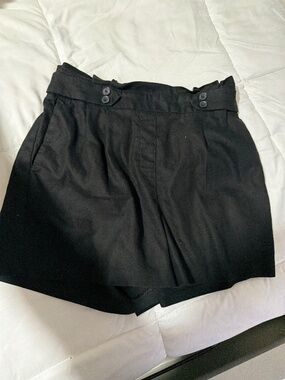 These are a pair of black Express women's high-waisted shorts